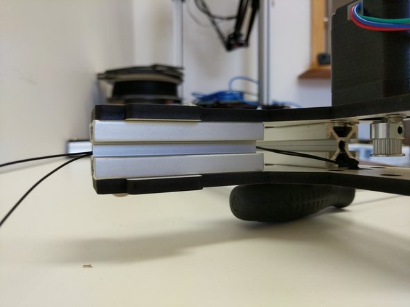 Route the wires as shown in the images.