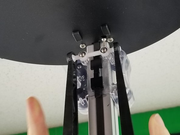 The ball-cup arm style will snap into place on each carriage.  Each carriage will use 2 arms.