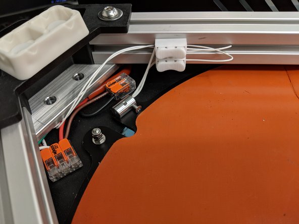 Make sure the connection is solid in this white connector. If they slip out, you will have to remove the bottom cover later to troubleshoot thermistor issues!