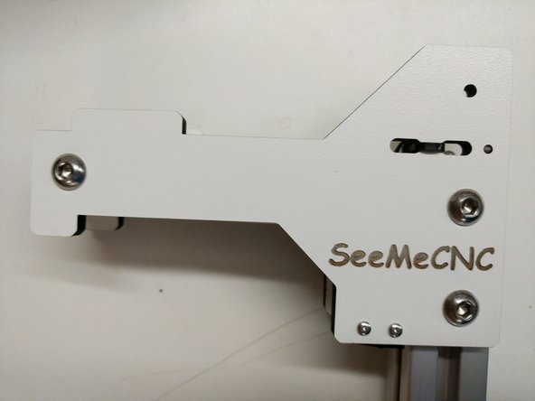 Use one of the supplied zip-ties to secure the end-stop wires to the laser cut piece (same side as end-stop)