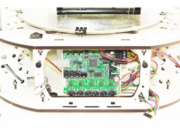 Remove the stepper motor wires from the RAMBo board one at a time. If they are not already labeled, please label them as you remove them. From left to right they should be labeled X Y Z _ E0 _