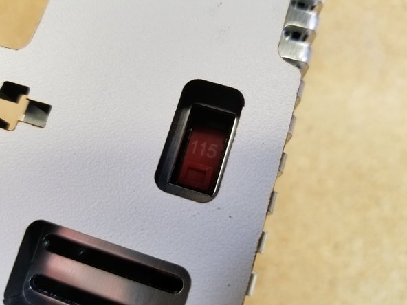 If you are located in the US, make sure the 220/110 switch is in the 110 (115) position, as indicated by the arrow. This defines the input voltage the power supply expects.