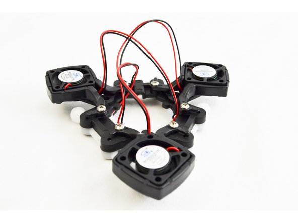 DO NOT PULL SO TIGHT AS TO RIP THEM OFF THE FAN, but pull the leads taught on the bottom side