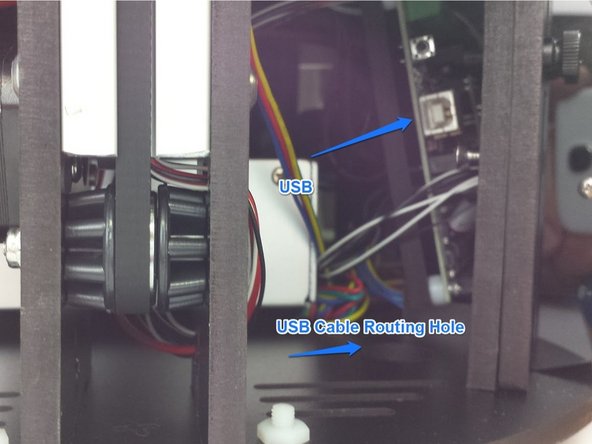 Install the USB cable (Note: the front left piece of acrylic has been removed in the image to make the location of the USB port more easily recognized. You can easily gain access to this location by removing the front LCD Controller Module. This module is fastened to the machine with (2) nylon thumb screws.)