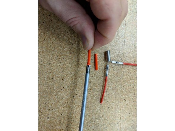 Use a screwdriver on one end of a tube to help open up one side. This will help get the tube over the crimps you just installed.