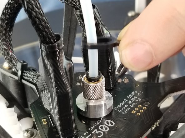 The following steps will be easier if you lower the hotend to the glass bed
