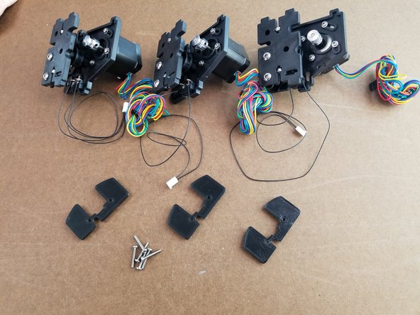 Flip the sheet metal frame upside down so the bottom is facing up so you can work on it.