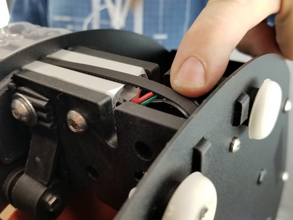 At this point look at the top and bottom idlers to make sure the belts are seated in the grooves of the idlers properly before clamping in place.