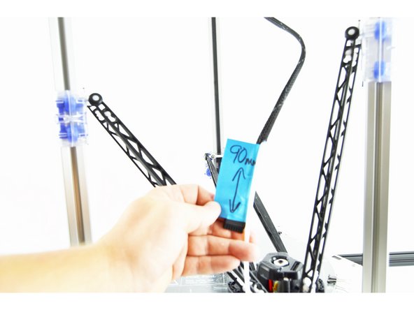 You want to insert the bowden tube into the mesh loom on the same side of the connector that has the beveled edges. This is noted in the picture with red makers.