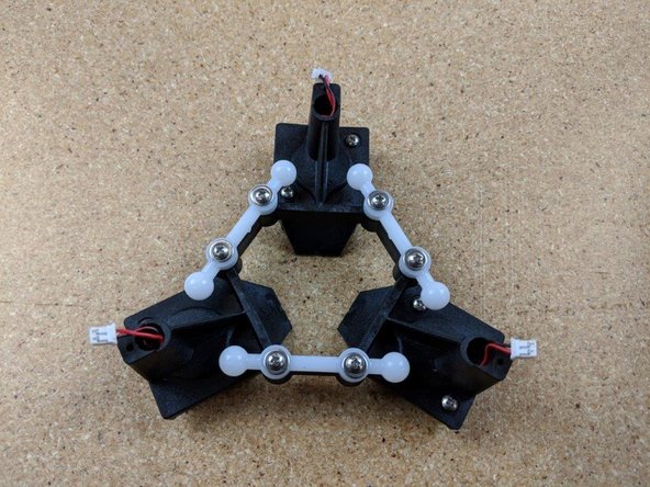 Fix each ball arm into place using two #4, 3/8&quot; screws and two washers.