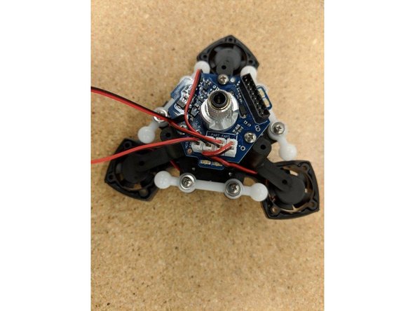 As you connect each fan wire, route the wire as shown in the photos.