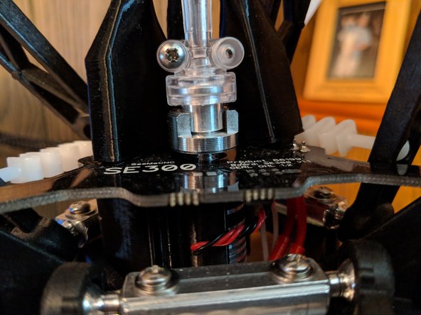 Install the collar onto the 2 into 1 adapter as shown in Figure 1.