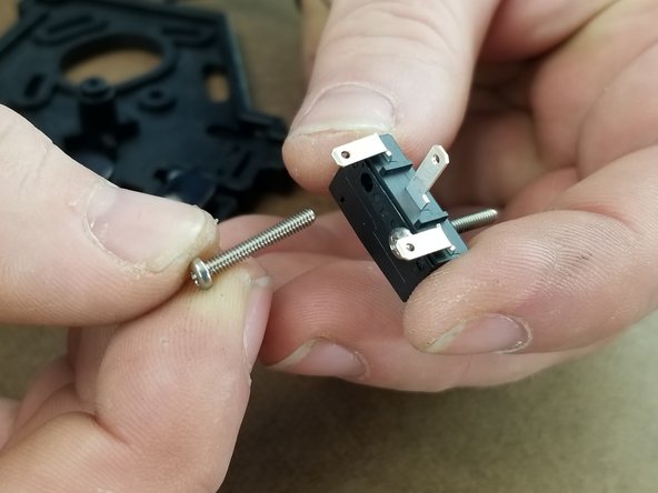 Insert 2 #4 threaded screws into the endstops.  Enter the endstop from the side the legs are facing as shown in Pic 1.