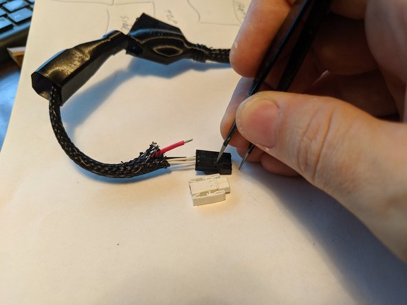 You will want to insert something into the window to press on the metal tab that holds the wire into the plug and slide the wire out of the plug.  In Pic 2 I am using a pair of tweezers to press on the locking tab.
