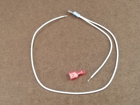 On the end of the short white wire, you will attach the spade connector.