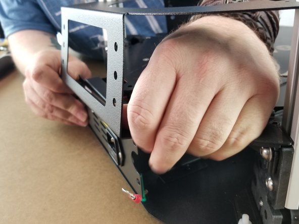 Slightly bend out the lip on the side of the power supply to wrap over the power supply bracket.