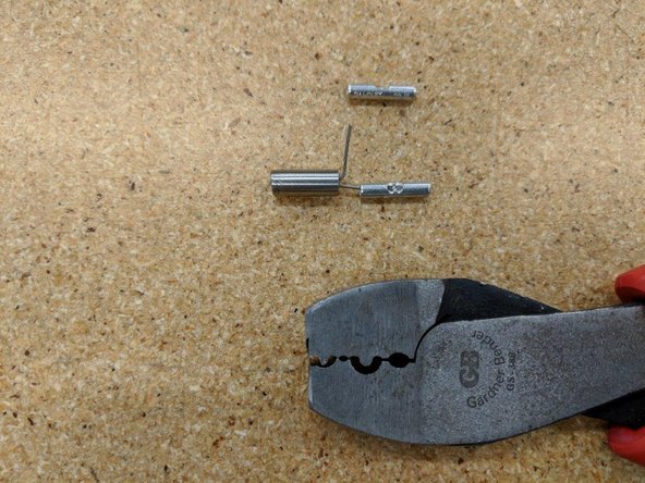 if you have a pair of crimps like the one in the picture, this will help.  The first position  near the tip of the crimps pictured are used  in this step.