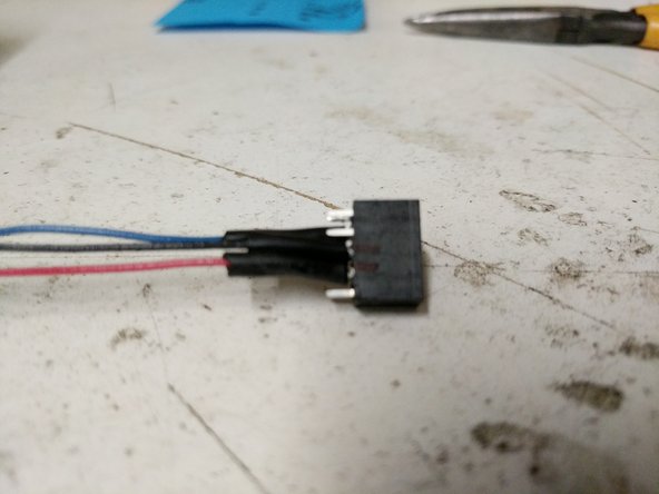 Solder the 26awg red and black wires  to the 10 position connector in the positions indicated in the image.