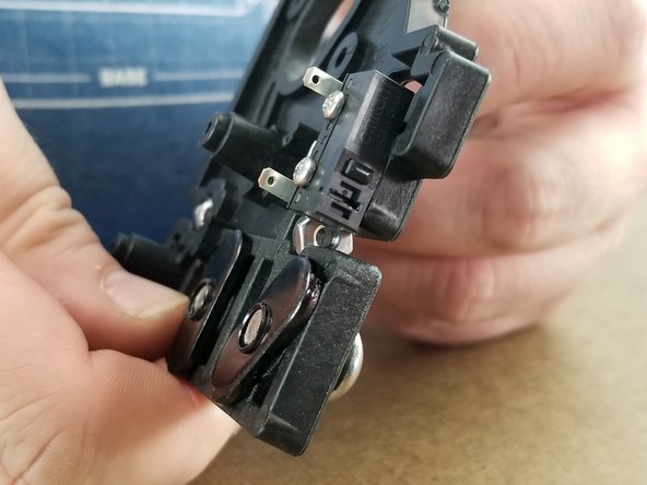 Pic 1 shows the installed endstop.  You will see the button on the endstop is facing the edge of the bracket and must be oriented as shown in Pic 1.