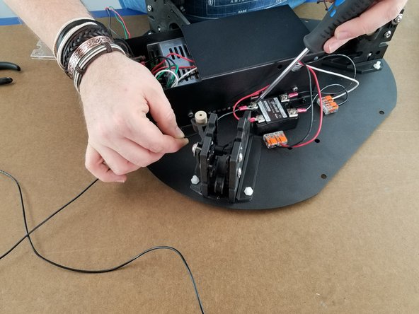 This step will use the other 1350mm long black wire with one ring terminal.