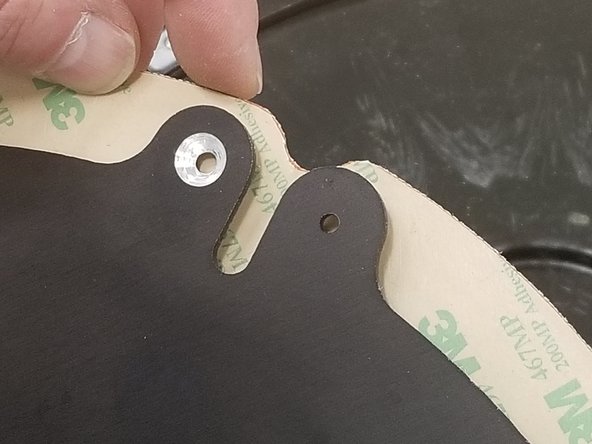 Peel the backing off of the adhesive on the 58801 Silicone Heater 300mm Dia 350W REV B