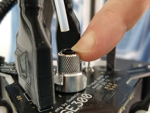 Un-clip the lanyard from the PTC fitting on the Hotend