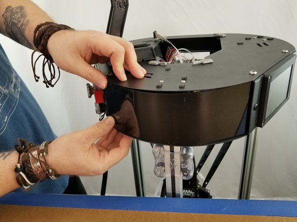 Carefully re-install your acrylic side panels.