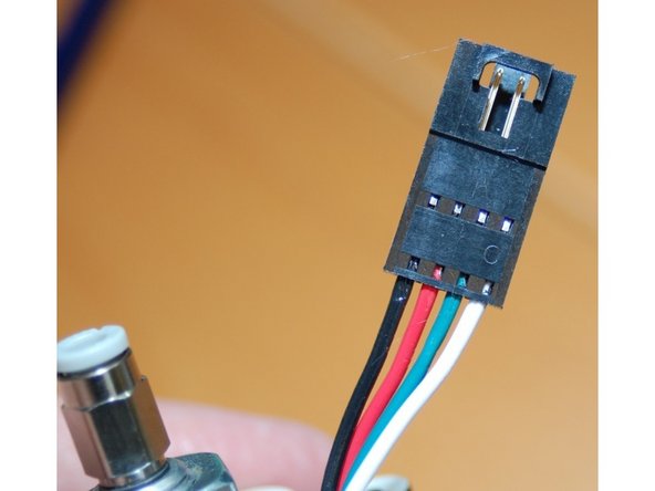 Strip about 1/4&quot; of insulation from the four wires coming off the hot end.  Depending on the version of the Rostock MAX you have, you'll either have 2 18ga and 2 26ga wires, or 4 18ga wires as shown in photo #1.  Add a male crimp pin to each of the four wires.