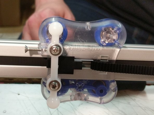 Route the belt as shown in the diagram on step 16