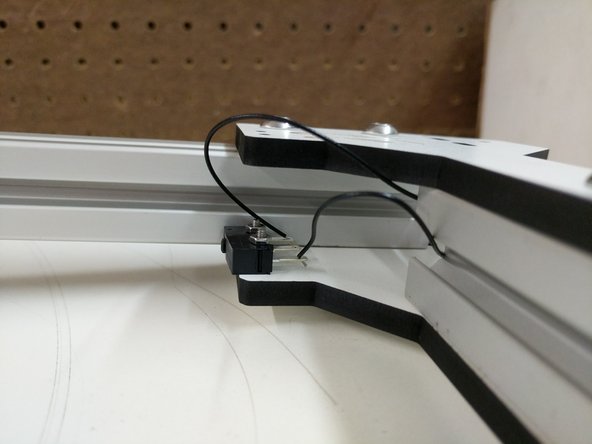 If you have any difficulty getting the wires through the TSLOT, you can use a length of filament to help guide the wires through.