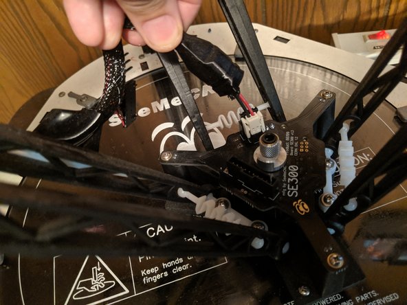 Lift the boot from the other plugs as shown in Pic 2 and unplug the clips under this boot as well.