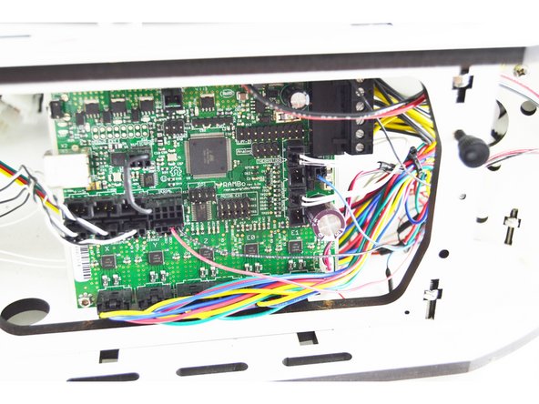 Tame any wires that are protruding from the front of the printer.