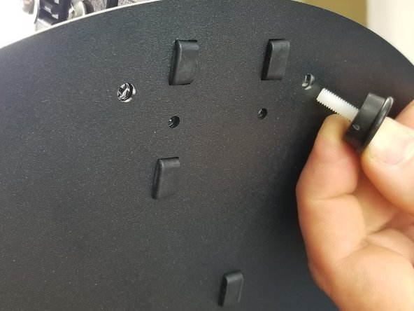 Insert the nylon screw and foot through the bottom of the plate and up through the shim plate, screwing into the nylon nut to secure the foot in place.