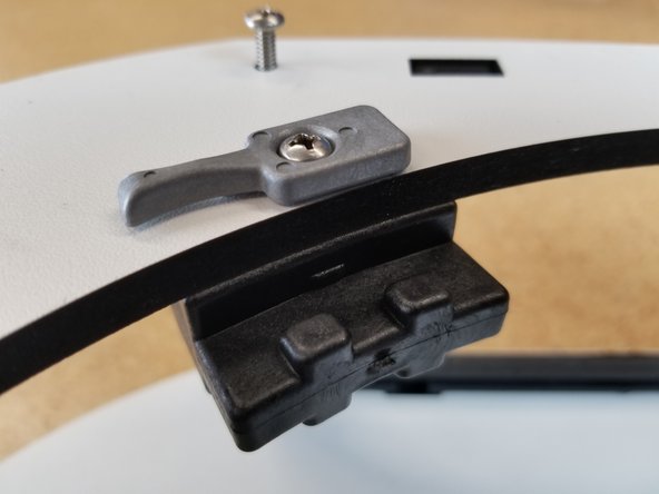 Using 6-32 x 1&quot; phillips pan head machine screws, gently tighten as shown. The  bed clamps should rotate easily, but not be loose.