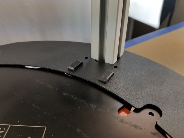 Push down the sheet metal cover over the brackets all the way as shown in Pic 1.  The brackets will slightly stick out of the sheet metal cover.