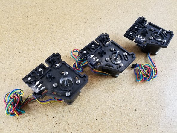 First install the end stop switches. You'll need a #1 Phillips screwdriver in order to install the 2-56 screws used to fix the end-stop switches in place. Take care to not over-tighten the screws! The switch body is delicate and is easy to crush. The holes are not tapped/thread.