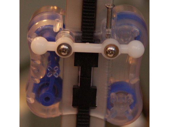 Fix the Ball Arm in place using two #4, 1/2&quot; machine screws and two #4 flat washers.