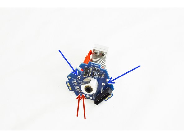 Confirm that you have the heater cartridge lead and the thermal safety fuse leg inserted in the through holes of the HE280 Hotend PCB board.