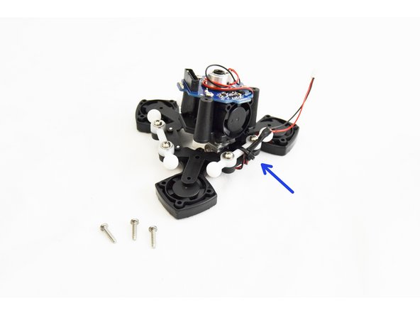 Orient the hotend assembly with the platform assembly such that the hotend fan is parallel with the ball joint that has the layer fan leads connected to it.