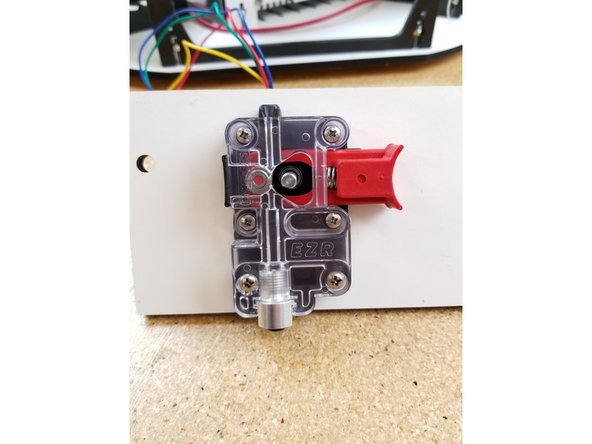 Install the EZR Struder as shown, using four M3 10mm screws to attach it to the motor, and two 6/32 1&quot; bolts and nylon lock nuts to attach it to the side panel.