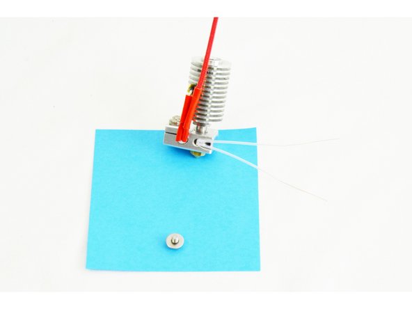 Insert the thermistor (glass bead end first) into the hole (closest to the heater cartridge) in the side of the heater block.