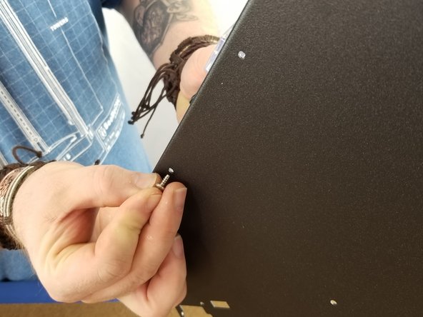 From the underside, attach the board support with a #6 sheet metal screw.