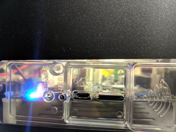 Plug in the power cable to printer.