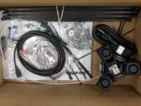 The smaller box in the base assembly pack is the accessory / assembly contents.