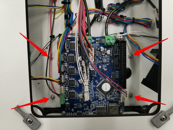 The mount will install in the pre-cut holes shown by the arrows.