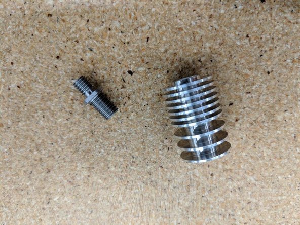 Locate the heat sink and heat break from the parts you just dissembled in  the previous step.