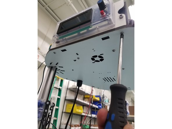 Next unscrew the 4 nylon standoffs holding the Rambo Board up. You will want to hold the standoff in place with one hand, while unscrewing it with the other from the bottom of the Laser Cut Plate.