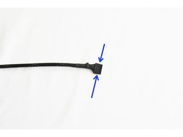 Attach a Wire Tie (26164) over the mesh loom. Secure the wire tie approximately 10mm from the end of the Pluggable 8 position Push-In Wire Terminal Plug. Tighten securely.