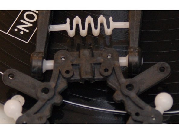 Perform this step at both tension spring locations - the &quot;top&quot; end at the carriage and the &quot;bottom&quot; end at the Ball Joint Platform.