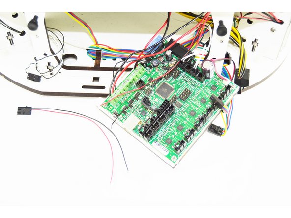 Strip approximately 10-15mm of insulation off of the black and red wires (with that are in the 4 pin latching housing).